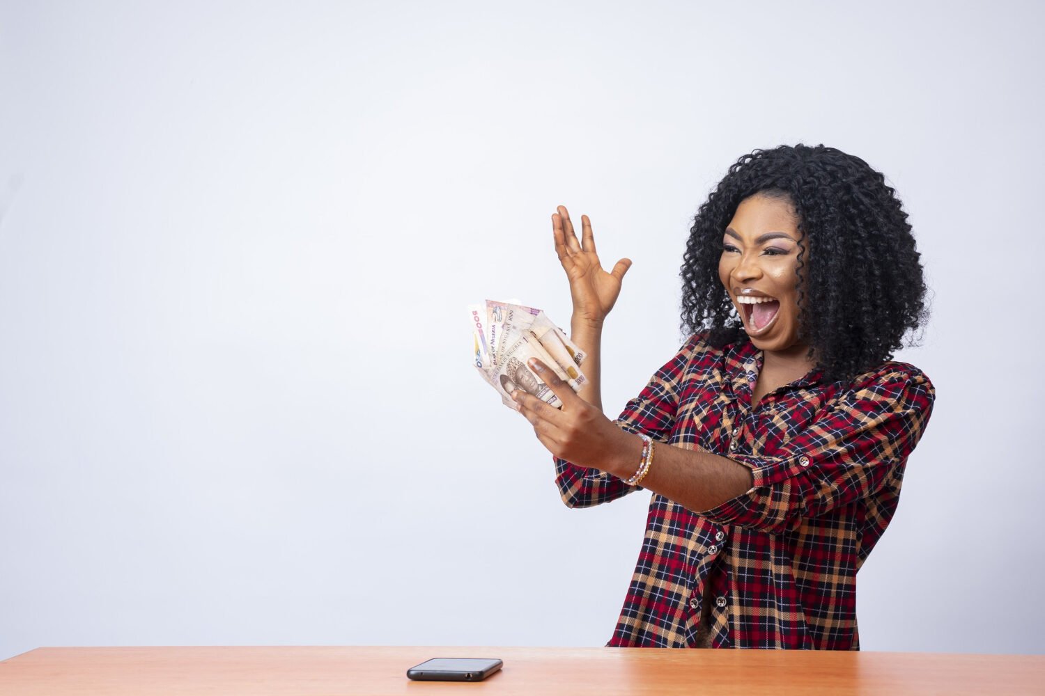 beautiful-black-woman-holding-looking-money-her-hand